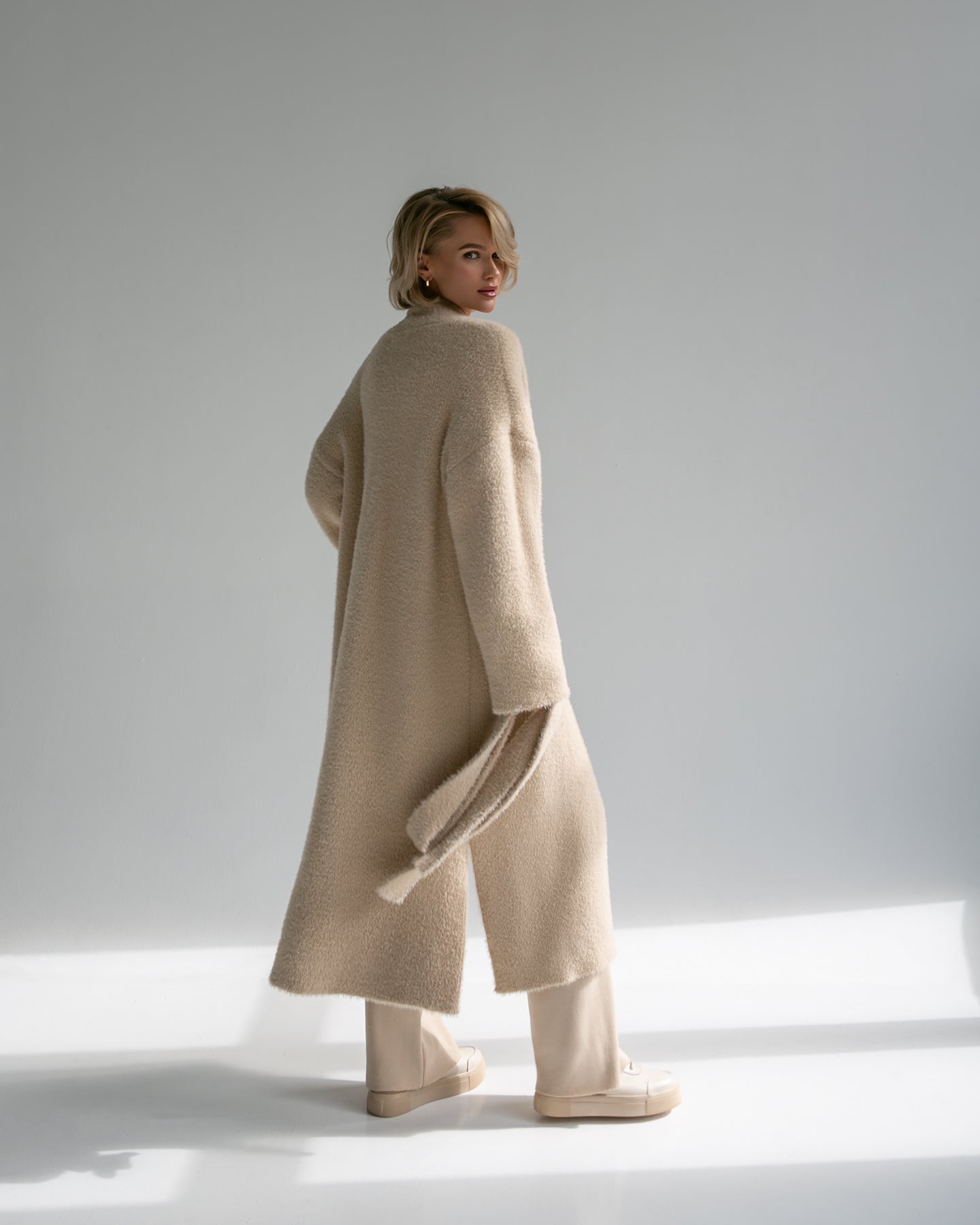 Beige fluffy cardigan sales