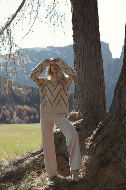 A Free-Style Round Neck Sweater Smereka With An Ornament Cream