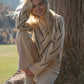 A Free-Style Round Neck Sweater Smereka With An Ornament Cream